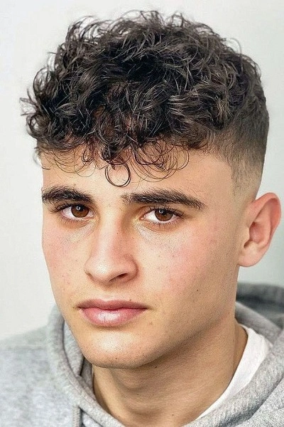 High Fade with Curly Hair for Men