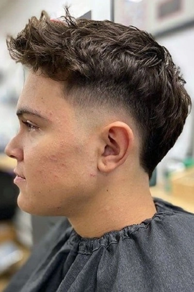 High Fade Mohawk Haircut for Men